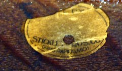 Partial early Stickley Brothers signature oval paper label.